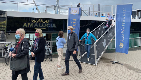 A small tour disembarks the AmaLucia. A small tour disembarks the AmaLucia.