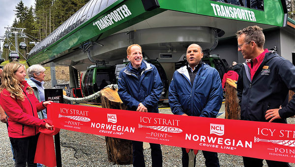 NCL president Harry Sommer, Huna Totem Corp. CEO Russell Dick and Icy Strait Point vice president of operations Tyler Hickman prepare to cut a ribbon to inaugurate a gondola transport system connecting one side of Icy Strait Point to the other. NCL president Harry Sommer, Huna Totem Corp. CEO Russell Dick and Icy Strait Point vice president of operations Tyler Hickman prepare to cut a ribbon to inaugurate a gondola transport system connecting one side of Icy Strait Point to the other.