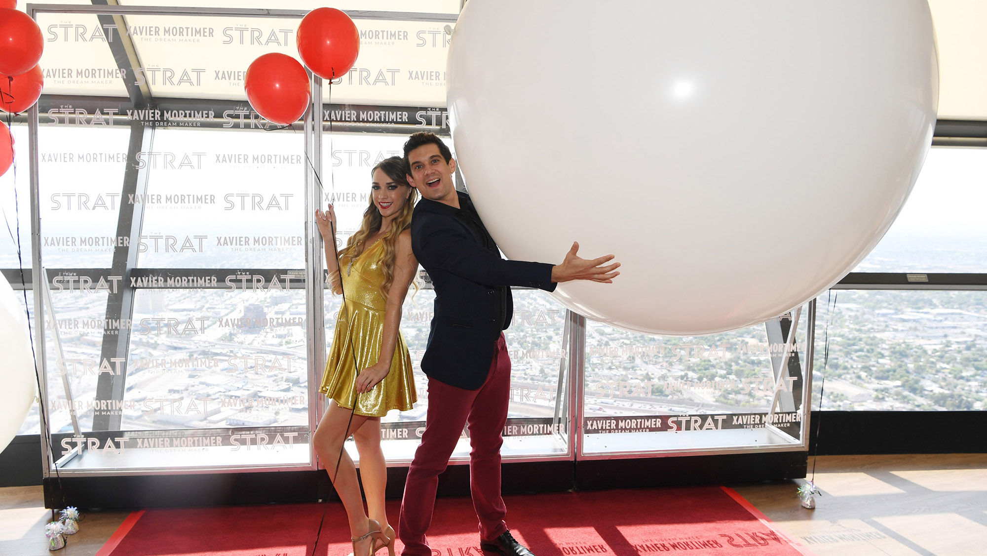 Xavier Mortimer, right, and Allie Sparks of "The Dream Maker" celebrated opening night at the 108 Observation Deck at the Strat.