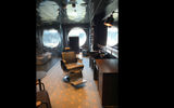 A barber chair at the ship's barbershop.