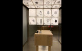 The entryway to the Test Kitchen, whose menu lists ingredients but not how the dish is prepared.