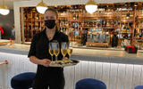 Champagne flows at the ship's Sip Lounge.
