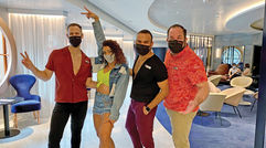 The Scarlet Lady had been operating in the U.K. this summer and is now making its way to Miami for its first cruise from Florida on Oct. 6. Pictured, members of the Happenings Cast on the Scarlet Lady: Jordan the Balancer, Michie the Flair, Joel the Hype and Will the Foodie. The Happenings Cast plays the role of a traditional cruise director.