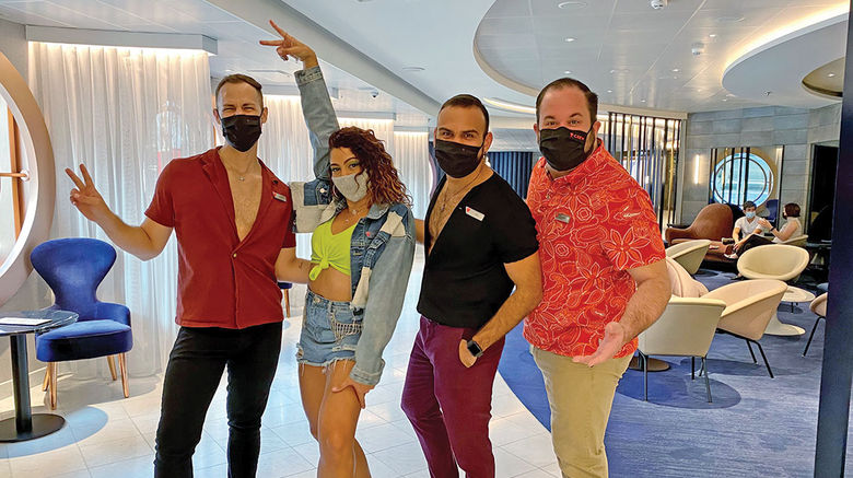 The Scarlet Lady had been operating in the U.K. this summer and is now making its way to Miami for its first cruise from Florida on Oct. 6. Pictured, members of the Happenings Cast on the Scarlet Lady: Jordan the Balancer, Michie the Flair, Joel the Hype and Will the Foodie. The Happenings Cast plays the role of a traditional cruise director.