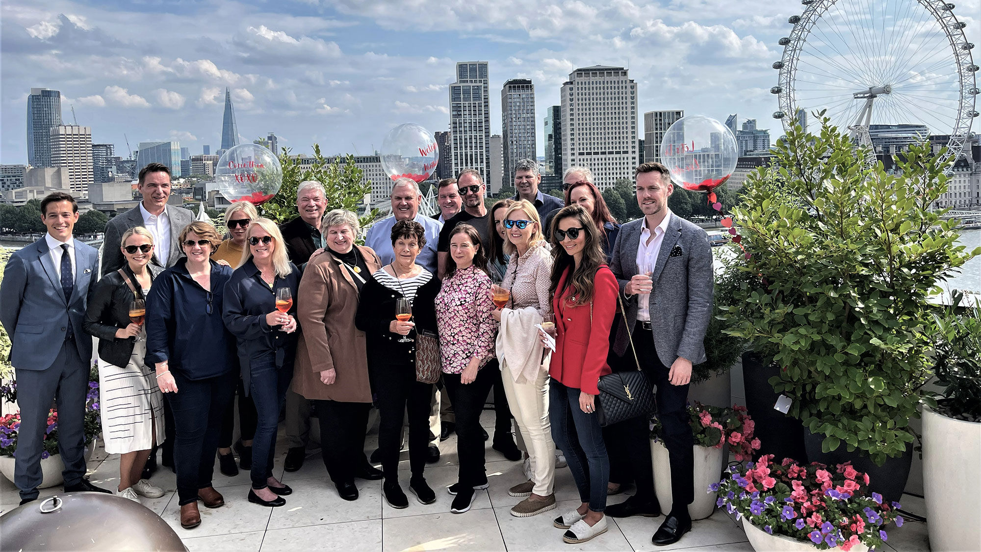The large balcony of Corinthia's royal suite overlooks the Thames River near the London Eye. Agents pose for a photo before lunch at Kerridge's, named for its Michelin-star chef, Tom Kerridge.