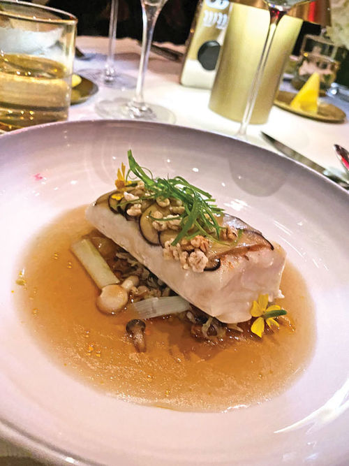 Slow-cooked halibut with ginger consommé will be on the menu at Le Voyage on the Celebrity Beyond. Slow-cooked halibut with ginger consommé will be on the menu at Le Voyage on the Celebrity Beyond.