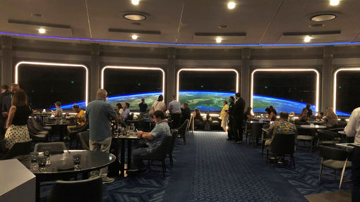 The Space 220 restaurant simulates the view from the dining room of a space station 220 miles above Earth.