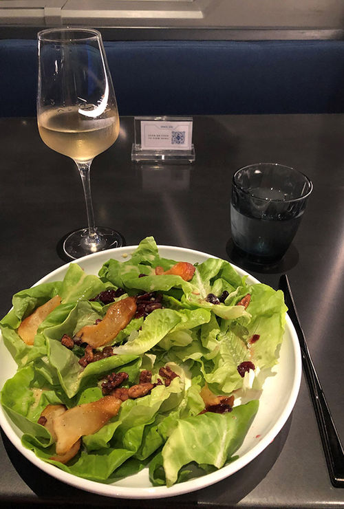 A "Lift Off" appetizer salad of bibb lettuce, spiced pecans, cranberries and roasted pears.