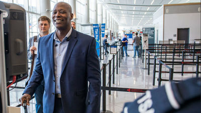 The program enables travelers to get through security via a camera and facial-recognition technology in lieu of physical identification and boarding passes.