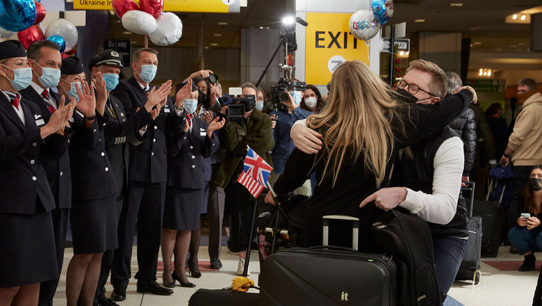 Loved ones reunite after British Airways BA001 flight arrives in New York.