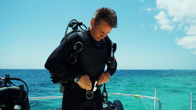 Fabien Cousteau suits up to dive into the waters of Curacao as part of his ocean-mapping project called Proteus.