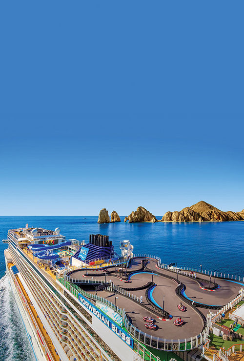 Go-kart racing on the top deck of the Norwegian Bliss as the ship navigates the waters off Cabo San Lucas, Mexico. Go-kart racing on the top deck of the Norwegian Bliss as the ship navigates the waters off Cabo San Lucas, Mexico.