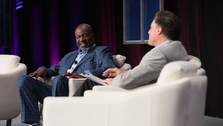 Azamara chairman Orlando Ashford and Travel Weekly editor in chief Arnie Weissmann at CruiseWorld in Miami.