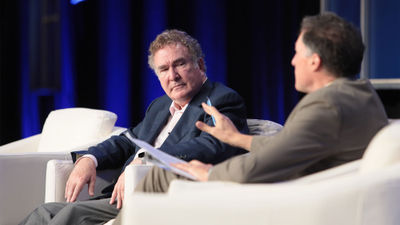 Royal Caribbean Group chairman and CEO Richard Fain at CruiseWorld with Travel Weekly editor in chief Arnie Weissmann