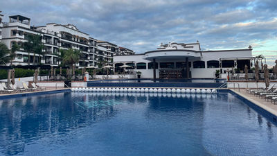 The pool area at the Grand Residences Riviera Cancun is the center of activity of the resort. The upper level is reserved for adults.
