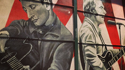 A mural in Belfast, which is known for its diverse music scenes and artists, including harpists, counter-culture punks, rock legends, ravers and traditional Irish musicians.