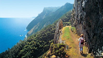 Visitors make the trek to Madeira to enjoy its mountainous tropical landscape, which rises to more than 6,100 feet above sea level.