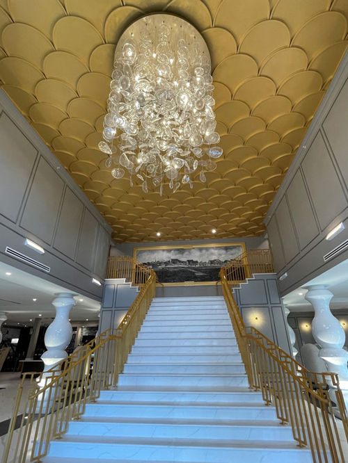 Whimsical touches at the Renaissance St. Augustine include a foyer chandelier made of dangling glass disks. Whimsical touches at the Renaissance St. Augustine include a foyer chandelier made of dangling glass disks.