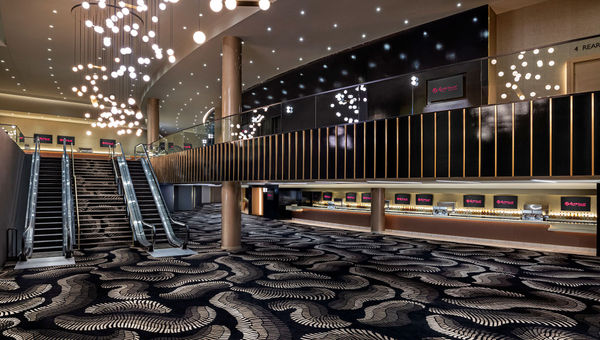 A modern-looking chandelier greets guests as they enter the lobby at the new Resorts World Theatre in Las Vegas.
