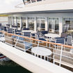 T0117ACLPROJECTBLUEFRWDLOUNGEEXT_C_HR [credit: American Cruise Lines]