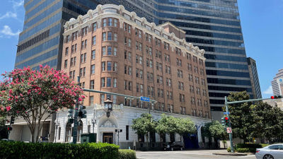 Restaurateur Robert Thompson has purchased the Whitney Hotel in partnership with the GBX Group.