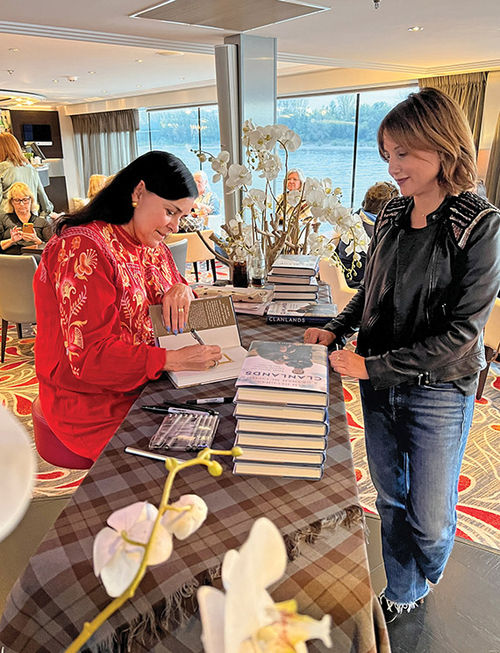 "Outlander" author Diana Gabaldon signs books during a cruise in October. Her sailings with Avalon inspired the Storyteller Series. "Outlander" author Diana Gabaldon signs books during a cruise in October. Her sailings with Avalon inspired the Storyteller Series.