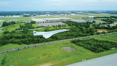 A rendering of the Overture supersonic jet flying above Greensboro.