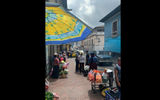 Vendors sell fresh fruits and vegetables along the streets of Old Town Quito.