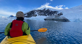 The Scenic Eclipse is part of a magnificent view from the kayak.