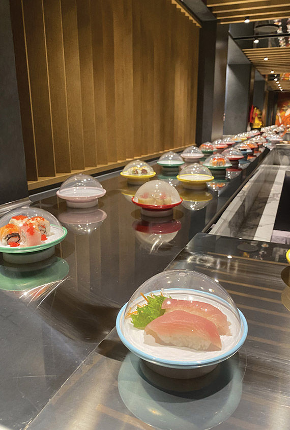 Sushi on color-coded plates at Kaito Sushi Bar.
