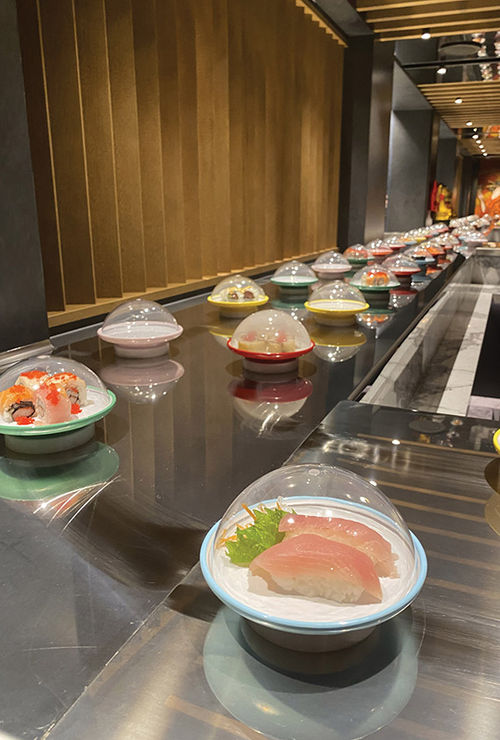 Sushi on color-coded plates at Kaito Sushi Bar. Sushi on color-coded plates at Kaito Sushi Bar.