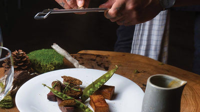 A chef preparing a Quark Expeditions Tundra to Table meal.
