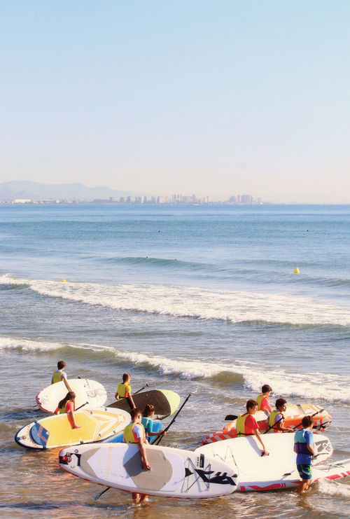 Paddleboarders in Valencia, which has 75 miles of beaches. Paddleboarders in Valencia, which has 75 miles of beaches.