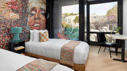 Guestrooms at the Hotel Castro have private balconies, separate sleep and lounge areas, and large photo mosaics. Guestrooms at the Hotel Castro have private balconies, separate sleep and lounge areas, and large photo mosaics.