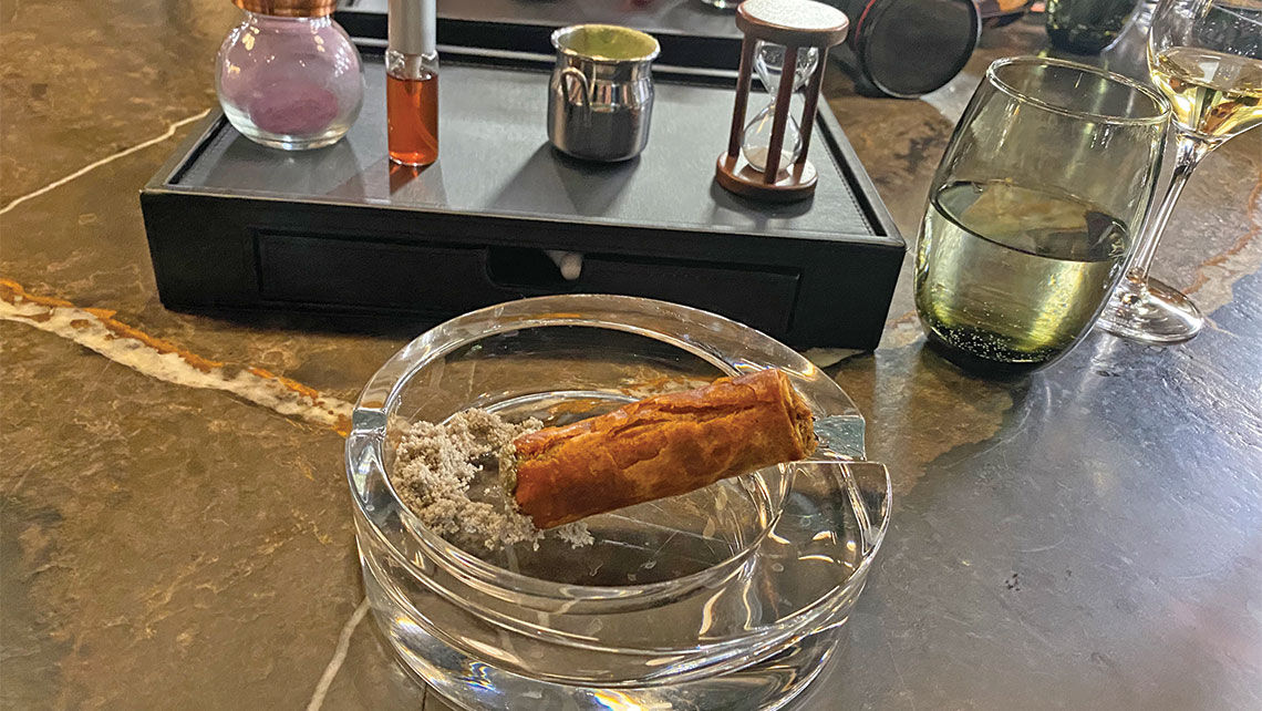 This sure looks like a cigar with ashes. But at the Eclipse's invitation-only Chef's Table restaurant, it's actually a filo pastry filled with beef ragu, bean paste and guacamole. In essence, an especially creative flauta.