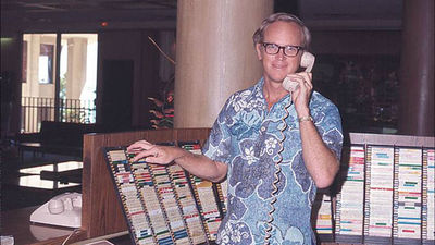 Dr. Richard Kelley works a front desk during the early 1970s. The former president and CEO of Outrigger Hotels and Resorts died on Feb. 24.