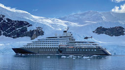 The Scenic Eclipse in Neko Harbor. The ship is the only one currently offering helicopter tours in the Antarctica cruise market.