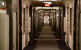 A hallway leading to cabins aboard the Halcyon.