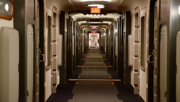 A hallway leading to cabins aboard the Halcyon.