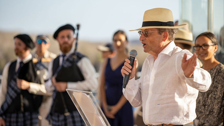 Silversea president and CEO Roberto Martinoli speaks at the christening ceremony for the Silver Origin. Godmother Johanna Carrion stands behind him, at the far right.