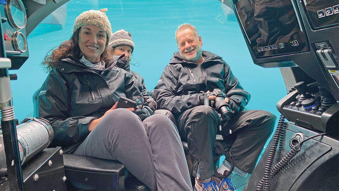 The Scenic Eclipse's submarine, the only one operating in the Antarctica cruise market, offers 270-degree views. Here, Laura Kiniry and Elliot and Jeanne Gillies smile from nearly 200 feet below the sea surface.