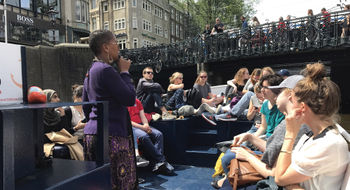 Black Heritage Tours founder Jennifer Tosch leads a group in Amsterdam on an exploration of the Netherlands' deep roots in Black history.