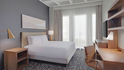A guestroom at the Hyatt Place LAX/Century Blvd. When a factory shutdown in Vietnam made it hard to procure cabinets, the hotel partnered with a local cabinet fabricator instead.