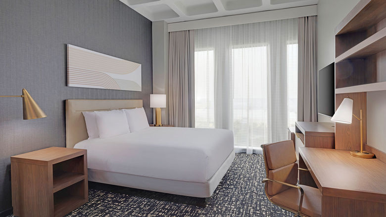 A guestroom at the Hyatt Place LAX/Century Blvd. When a factory shutdown in Vietnam made it hard to procure cabinets, the hotel partnered with a local cabinet fabricator instead.