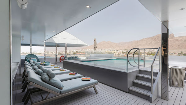 The infinity-style pool is the centerpiece of the Aqua Lounge on Deck 6.