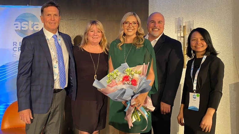Vanessa McGovern (holding flowers) was named the Emerald Luna's godmother.