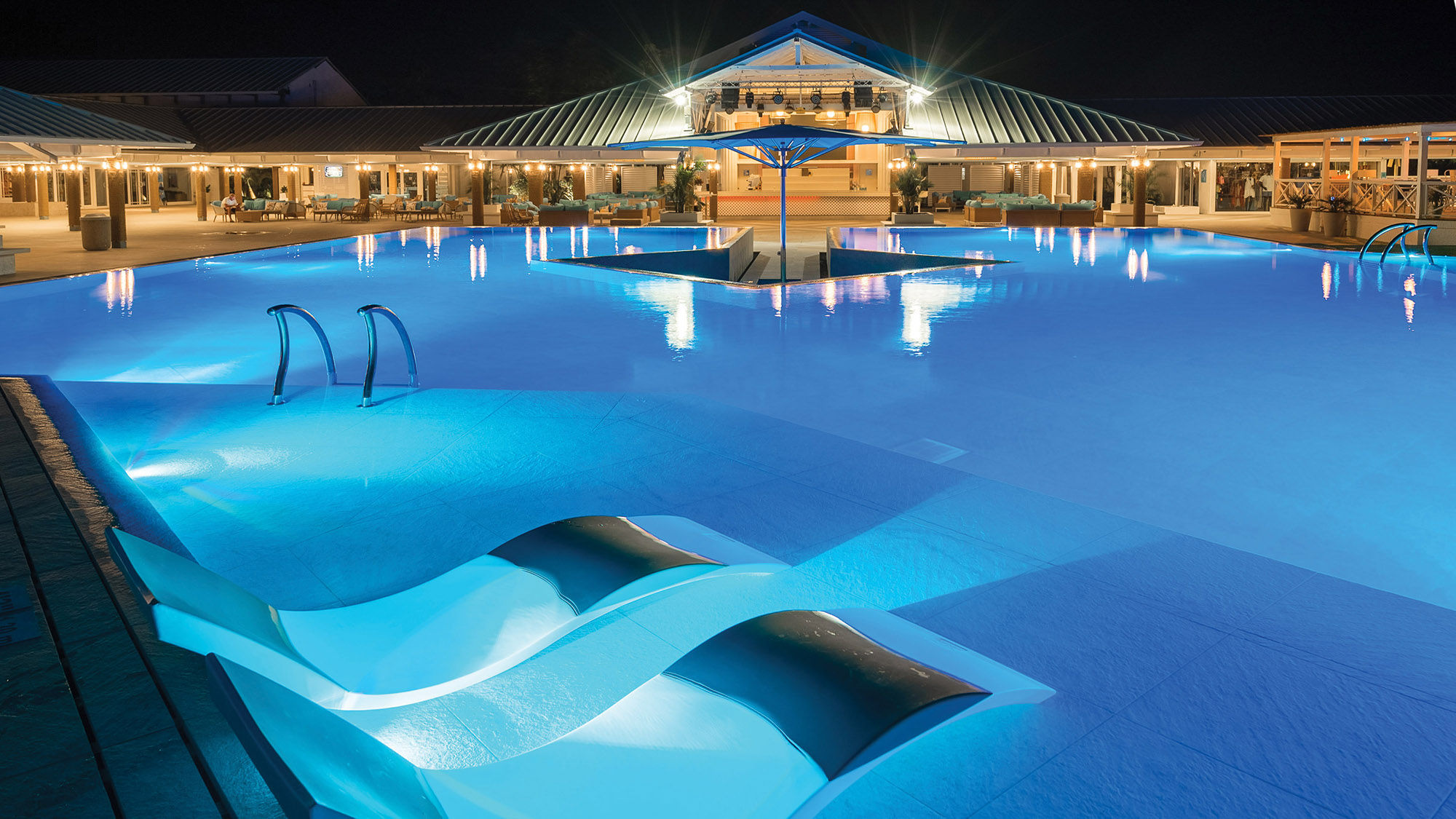 The pool area at the Club Med Turkoise in Turks and Caicos. The all-inclusive model originated with the Club Med brand in the 1950s.