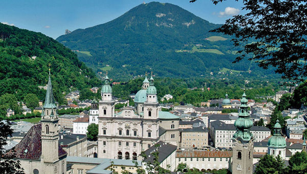 The cathedral district of Salzburg is surrounded by the Austrian Alps.