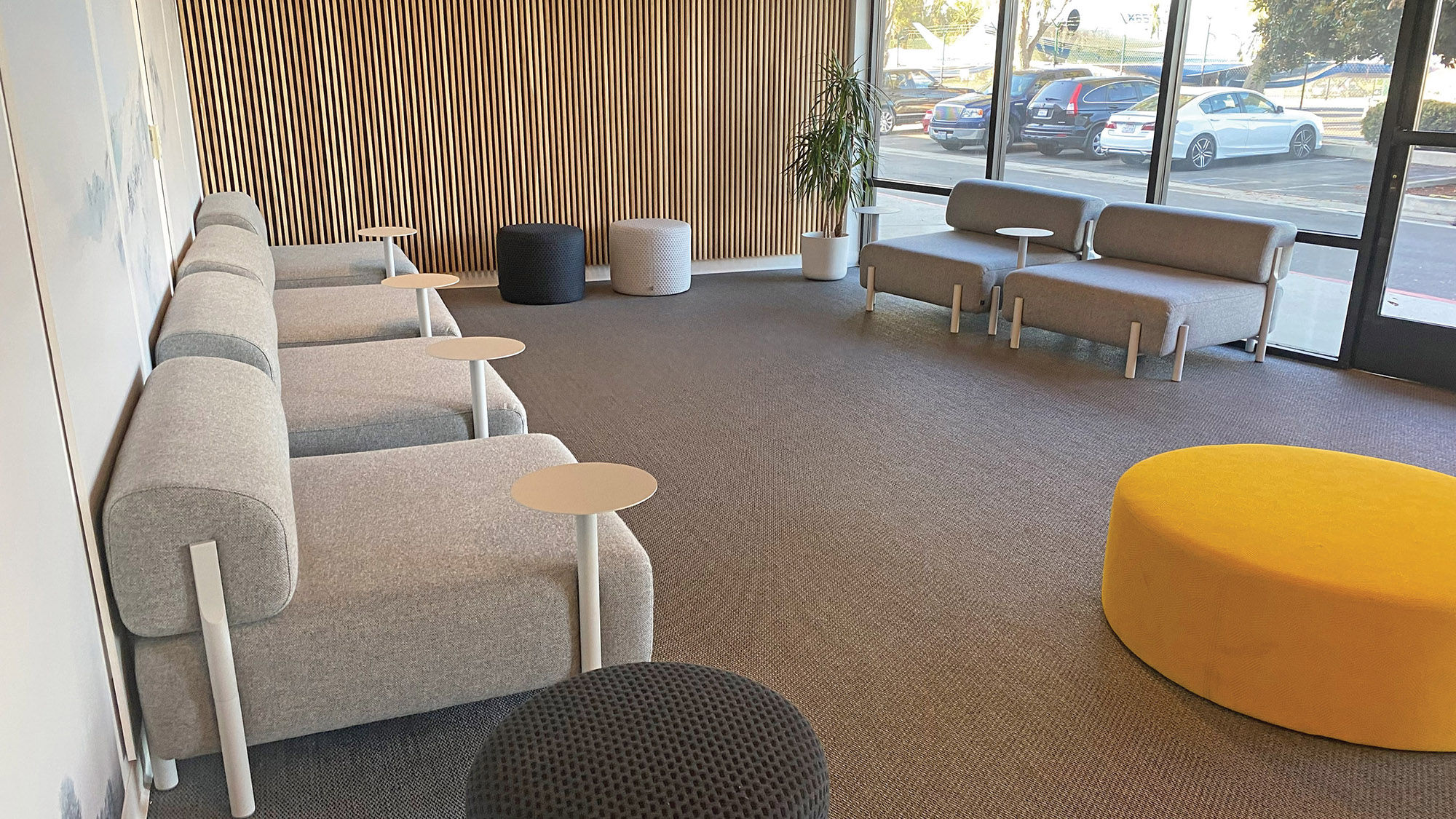 The Aero "terminal" at Van Nuys Airport is a lounge with modern decor, comfortable seating and complimentary snacks and beverages.