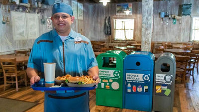 Three bins for compost, recycling and trash at Restaurantosaurus in Disney's Animal Kingdom.